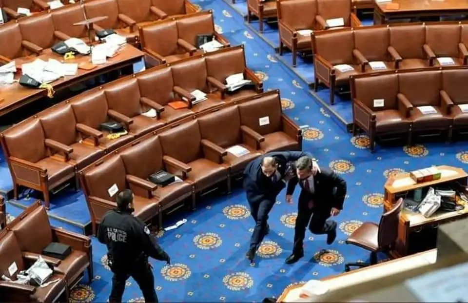 Rightwing Terrorists March on the Capitol Building Under 'Trump Flags'